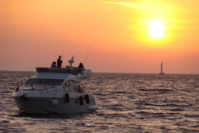 Private Motor Yacht Cruise with BBQ, Open Bar & Transfers - The Caldera Coast and Santorini from the sea
