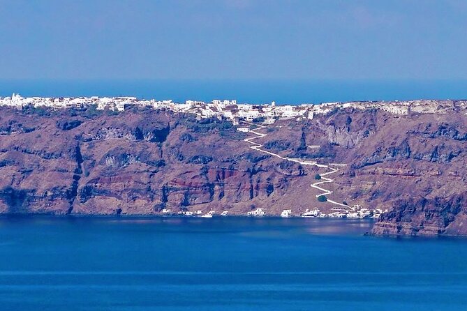 Private Motor Yacht Cruise with BBQ, Open Bar & Transfers - Sea caves, Indian Rocks, and the Venetian Lighthouse
