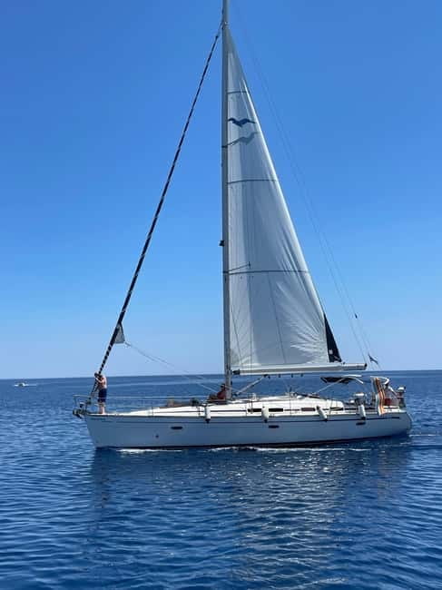 Rhodes: Sunset Catamaran Cruise with Snack, Fruits & Drinks - Fruit, drinks, and the question of food