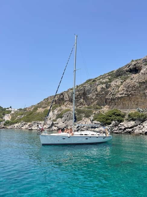Rhodes: Sunset Catamaran Cruise with Snack, Fruits & Drinks - The return ride and sunset near Elli Beach