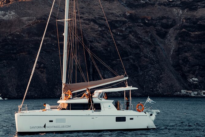 Romantic Sunset Catamaran Caldera Cruise incl. Meal & Drinks - Red Beach from the water
