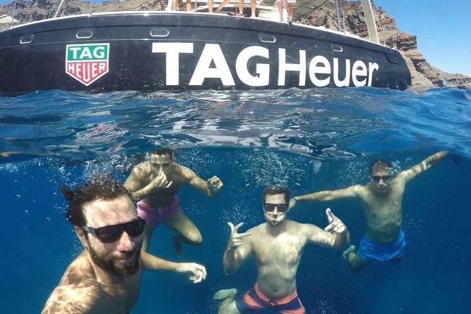 Santorini Adventurous Catamaran Experience with Snorkeling - White Beach and the pleasure of arriving by boat