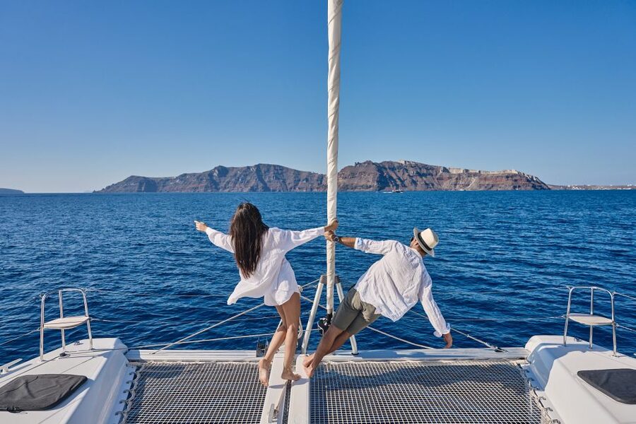 Santorini: Caldera Luxury Catamaran Cruise w/ Meal & Drinks - White Beach and Mesa Pigadia by boat