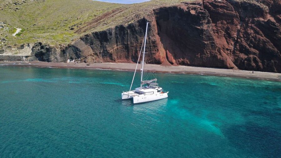 Santorini: Caldera Luxury Catamaran Cruise w/ Meal & Drinks - The Akrotiri Lighthouse and Indian Face Mountain
