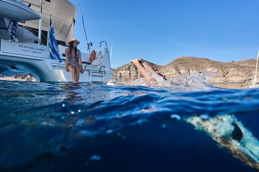 Santorini: Caldera Luxury Catamaran Cruise w/ Meal & Drinks - Nea Kameni and the volcanic water