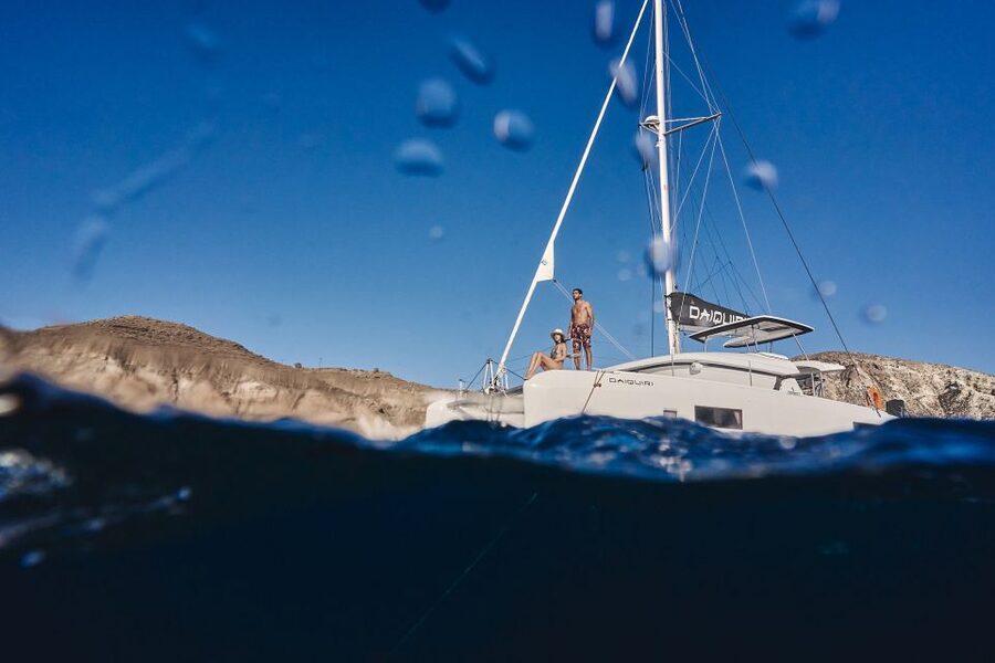 Santorini: Caldera Luxury Catamaran Cruise w/ Meal & Drinks - Pickup from your hotel to Vlichada Marina