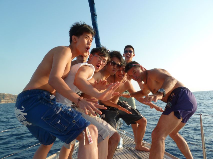 Santorini Caldera: Morning Sailing Cruise with Meal - The return past Aspronisi Island