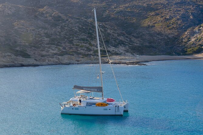 Santorini: Caldera Private Catamaran Cruise with Meal & Drinks - From Vlichada to Santorini’s red volcanic shore