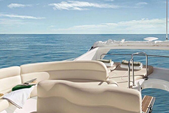 Santorini Caldera: Private Flybridge Yacht Experience - Red Beach starts the swimming day