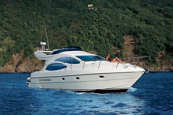 Santorini Caldera: Private Flybridge Yacht Experience - White Beach is the short photo stop