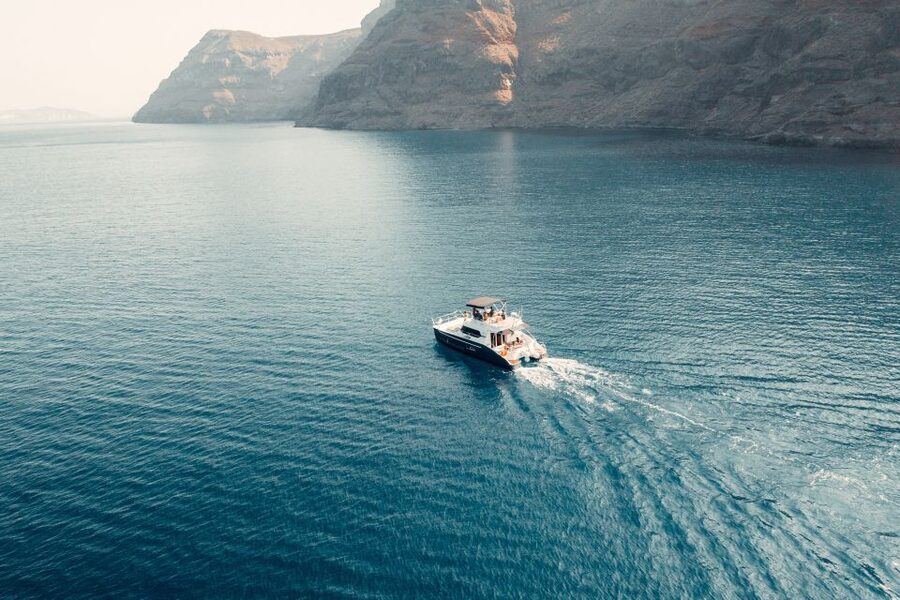Santorini: Caldera Private Power Catamaran Cruise - Sunset, photographs, and time on deck