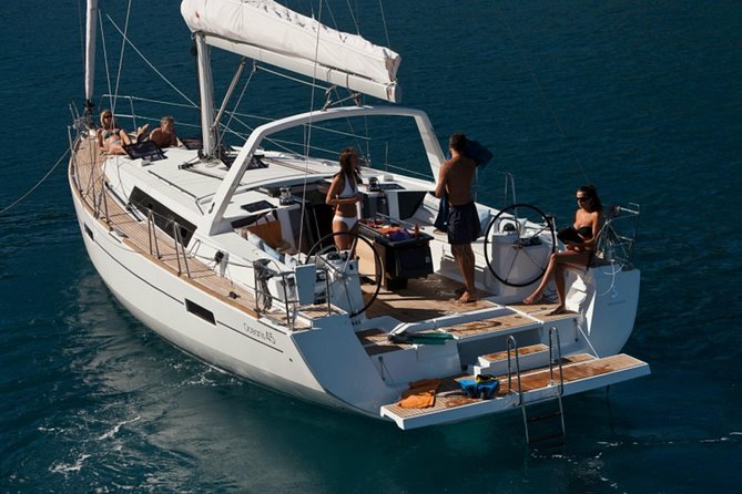 Santorini Caldera Private Sailing Boat Cruise - Akrotiri Lighthouse and the volcanic coast