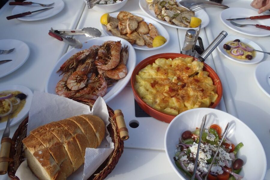 Santorini Caldera: Sunset Sailing Cruise with Meal - Swimming near Mesa Pigadia and the volcanic coast