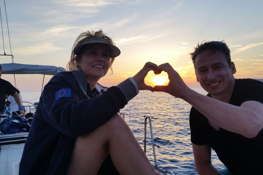 Santorini Caldera: Sunset Sailing Cruise with Meal - Palea Kameni, Nea Kameni, and warm volcanic water