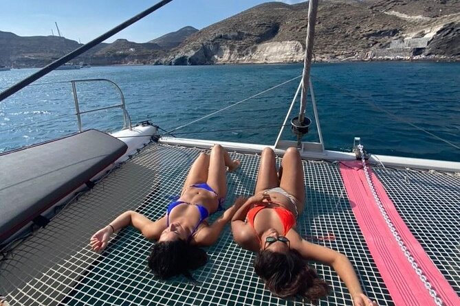 Santorini Catamaran Cruise – 5-Hour Private Sailing Experience - Passing the lighthouse from the sea