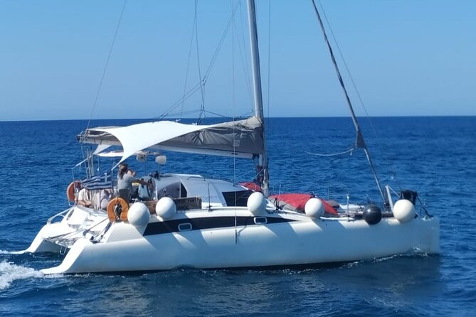 Santorini Catamaran Cruise – 5-Hour Private Sailing Experience - Meeting Santorini Volcano up close