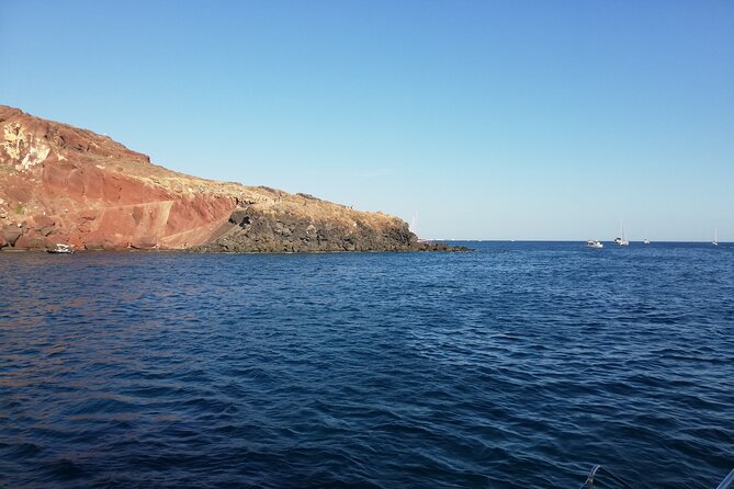 Santorini Catamaran Cruise with Fresh Meal and Open Bar - Why seeing Santorini by catamaran works so well