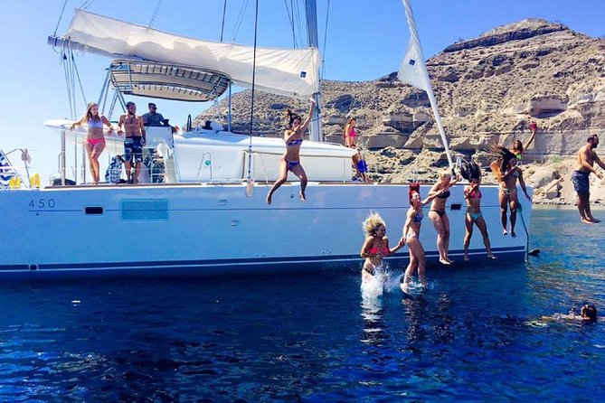 Santorini Catamaran Cruise with Fresh Meal and Open Bar - Mesa Pigadia, Black Mountain, and Indian Rock