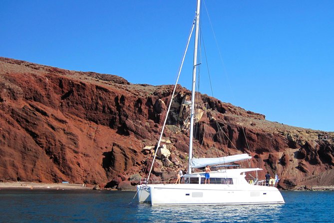 Santorini Catamaran Cruise with Fresh Meal and Open Bar - Lunch, drinks, and the best part of the day