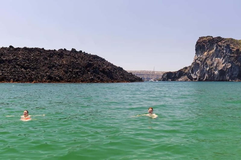 Santorini: Catamaran Cruise with Fresh Meal & Open Bar - A generous Greek meal with local drinks