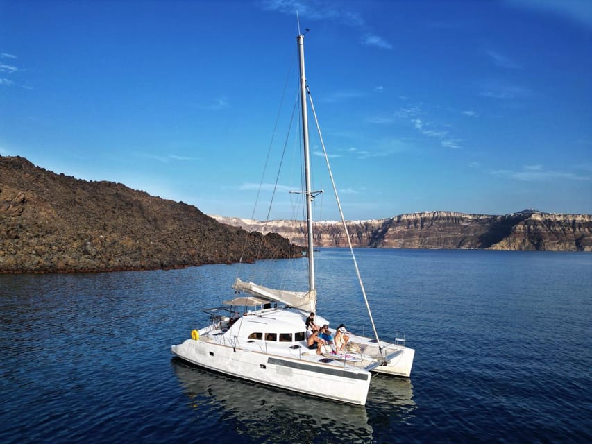 Santorini: Catamaran Cruise with Greek BBQ and Drinks - Timing, weather, and what to pack