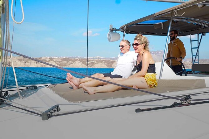 Santorini Catamaran Cruise with Greek Meal, Open-Bar and Sunset - Choosing morning or sunset
