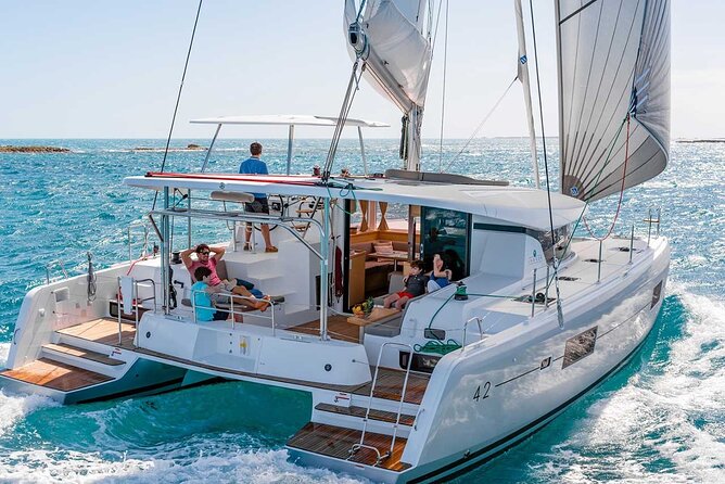 Santorini Catamaran Cruise with Greek Meal, Open-Bar and Sunset - From your hotel to the marina