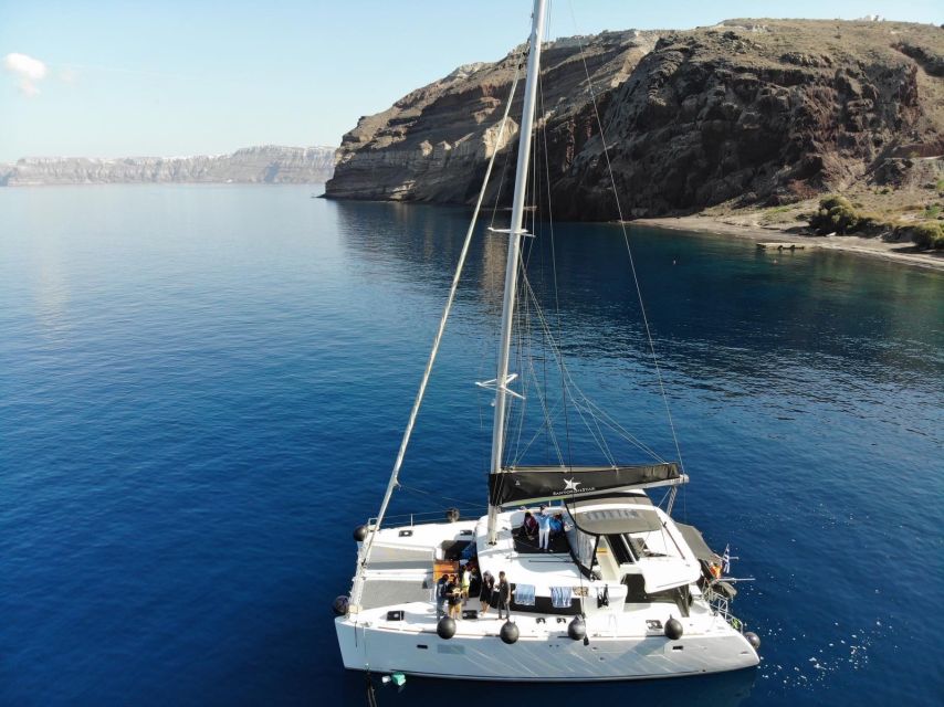 Santorini: Catamaran Cruise with Meal & Open Bar - Sunset from the water