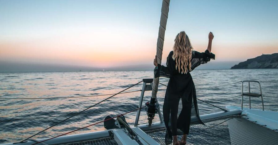 Santorini Catamaran Cruise with Swimming, Meal and Open Bar - Boat size, comfort, and the social mood