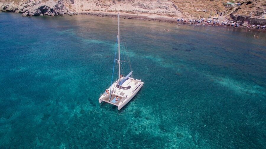 Santorini:Catamaran: private cruise with food & drinks - Sunset sailing and the changing schedule