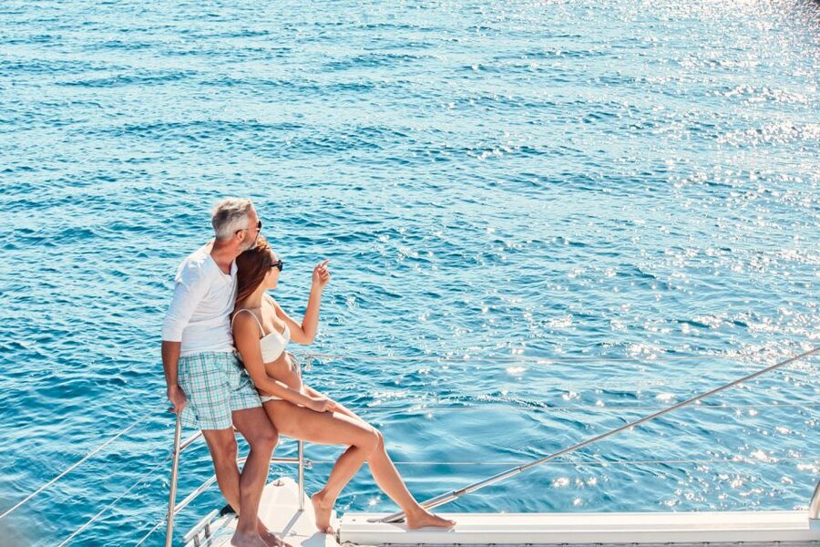 Santorini: Catamaran Tour with BBQ Meal and Unlimited Drinks - Sailing past Aspronisi, Akrotiri, and Indian Rock