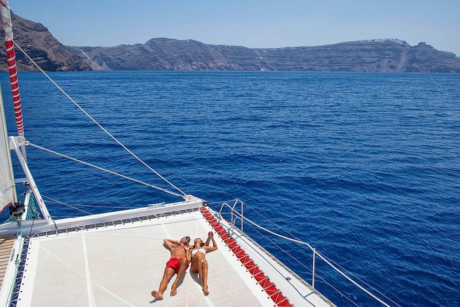 Santorini Cruise on Catamaran with BBQ & Open Bar - Hot Springs and the volcanic coast