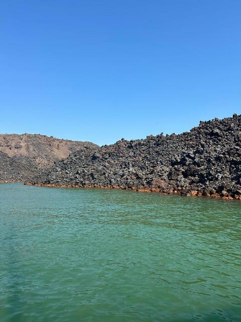 Santorini:Cruises with Catamaran around the Volcanic Island. - Mesa Pigadia turns lunch into part of the cruise