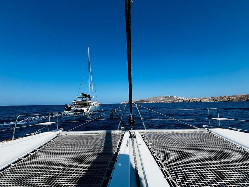 Santorini:Cruises with Catamaran around the Volcanic Island. - Drinks, towels, and the practical comforts