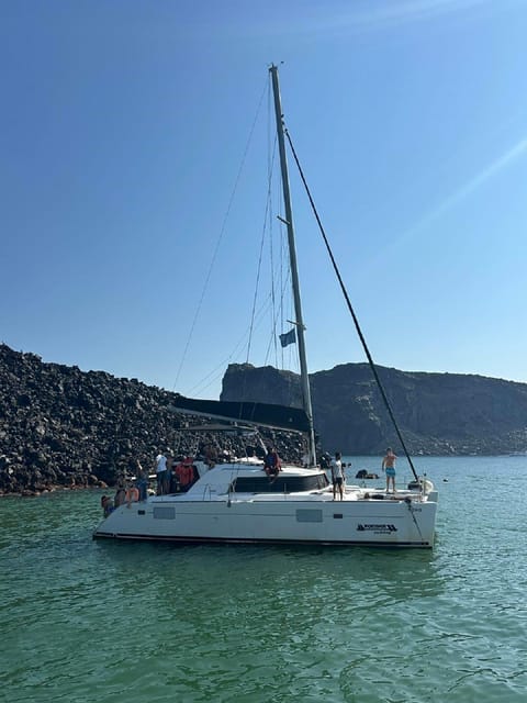 Santorini:Cruises with Catamaran around the Volcanic Island. - Daylight cruise or sunset cruise?