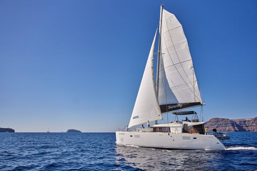 Santorini: Day Luxury Catamaran Cruise with Meal & Drinks - Why a catamaran is a smart way to see Santorini