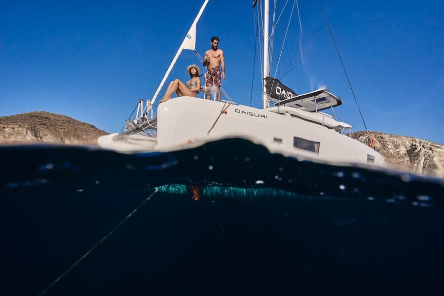 Santorini: Day Luxury Catamaran Cruise with Meal & Drinks - Drinks, music, and the feel onboard