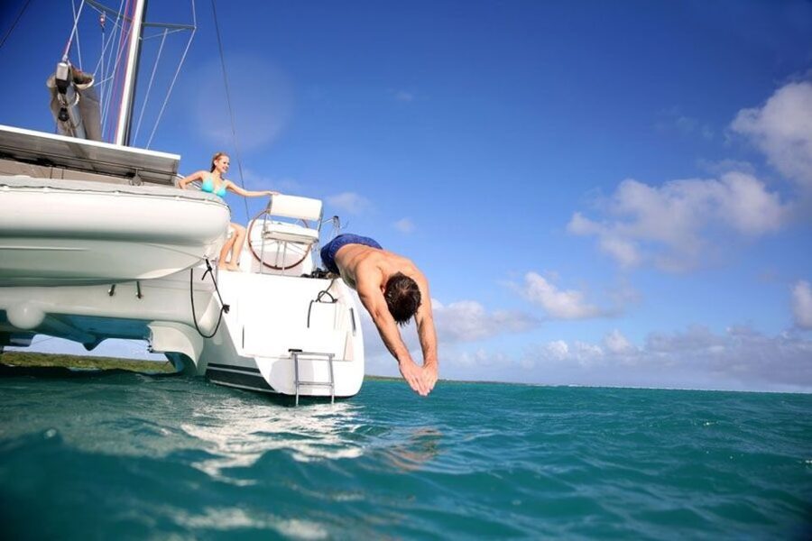Santorini: Dream Catcher 5-hour Sailing Trip in the Caldera - Entering the Caldera by Indian Head Mountain