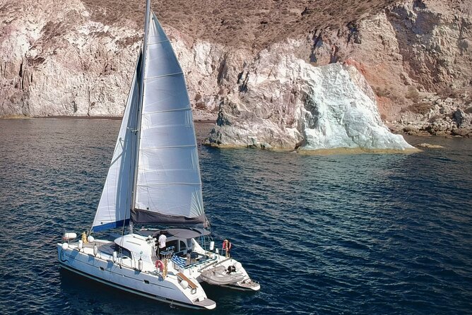 Santorini: Full-Day Catamaran Cruise, with Food|Drinks - Swimming and lunch near Ios
