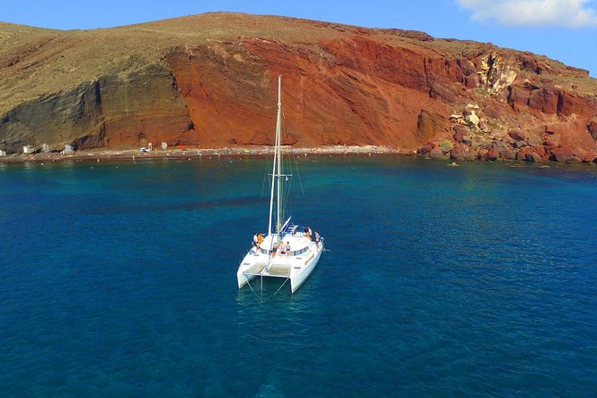 Santorini Full Day Catamaran Private Cruise incl. Meal, Drinks & Free Transport - Setting off from Vlychada Port