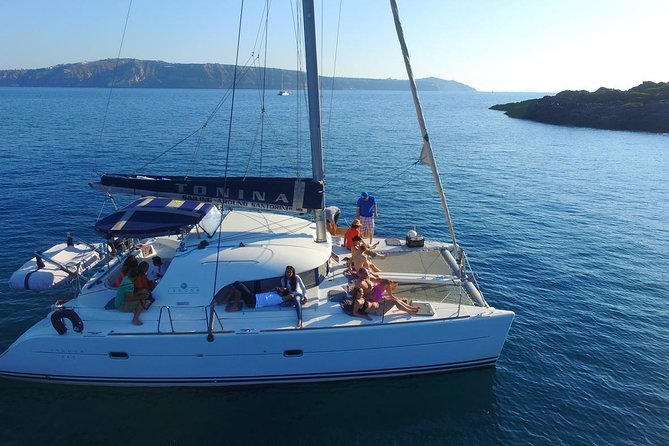 Santorini Full Day Catamaran Private Cruise incl. Meal, Drinks & Free Transport - The caldera, hot springs, and volcanic islands