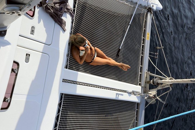 Santorini Full Day Catamaran Private Cruise incl. Meal, Drinks & Free Transport - Red Beach and White Beach by boat