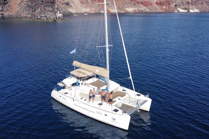 Santorini Gold Catamaran Cruise with BBQ, Drinks and Hotel Pickup - Starting at Vlichada on Santorini’s southern coast