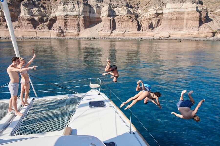 Santorini Gold Catamaran Cruise with Snorkel, BBQ & Open Bar - Setting Out From Vlychada Marina