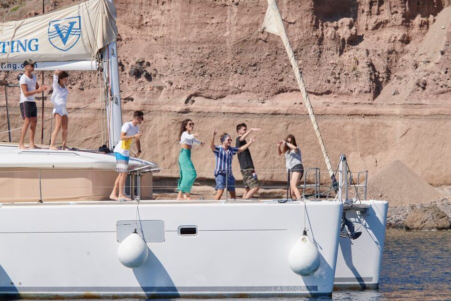 Santorini Gold Catamaran Cruise with Snorkel, BBQ & Open Bar - White Beach and the Venetian Lighthouse