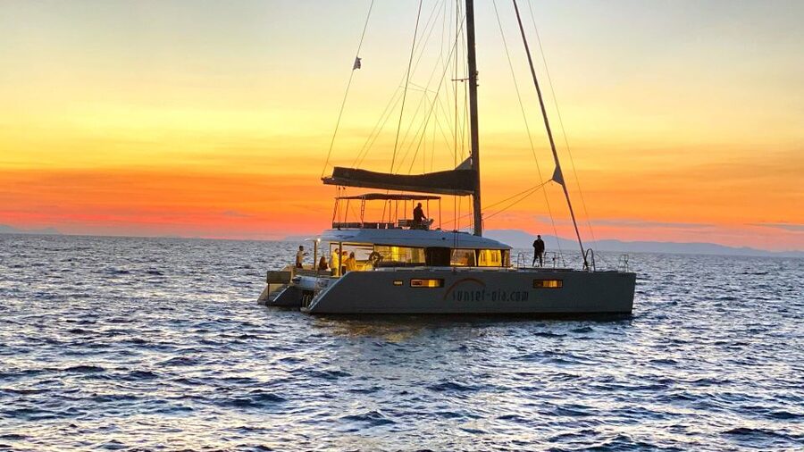 Santorini: Luxurious Catamaran Cruise with Meal & Open Bar - Palea Kameni Hot Springs: warm water with a warning