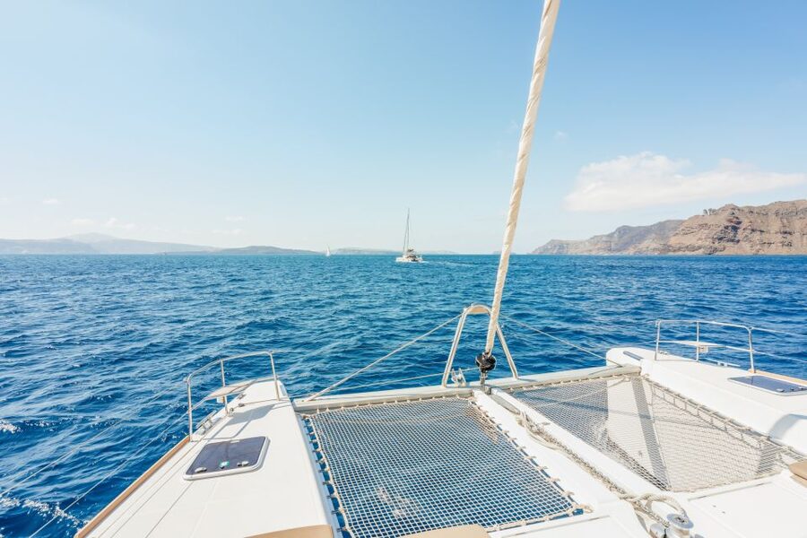 Santorini: Luxury Catamaran Day Trip with Meal and Open Bar - Why seeing Santorini from a catamaran matters