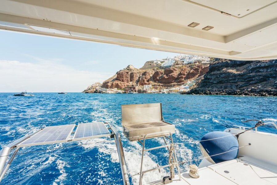 Santorini: Luxury Catamaran Day Trip with Meal and Open Bar - Red Beach and White Beach from the sea