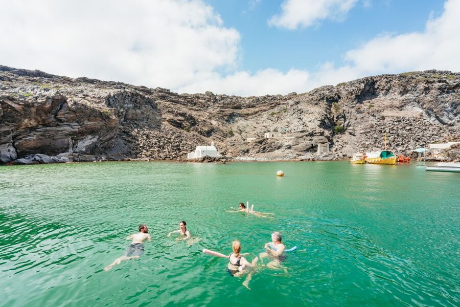 Santorini: Luxury Catamaran Day Trip with Meal and Open Bar - The caldera views between the stops