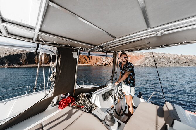 Santorini Luxury Catamaran Private Cruise - Black Mountain, the lighthouse, and Indian Rock